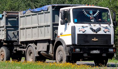 MAZ 555142-4229 with a trailer